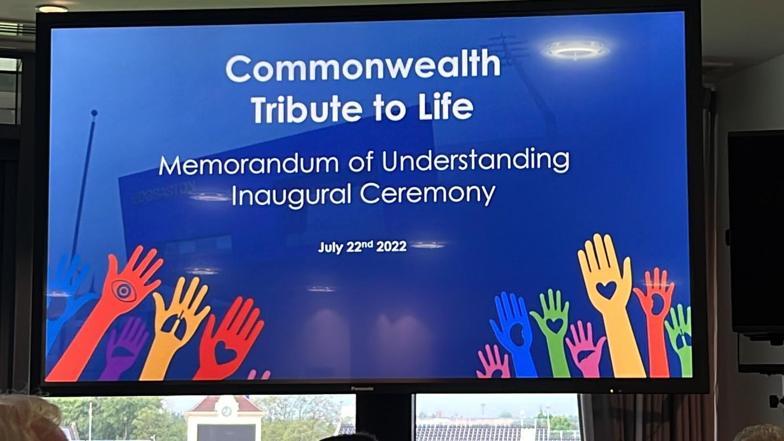 Screen showing the Commonwealth Tribute to Life memorandum of understanding inaugural ceremony, July 2022